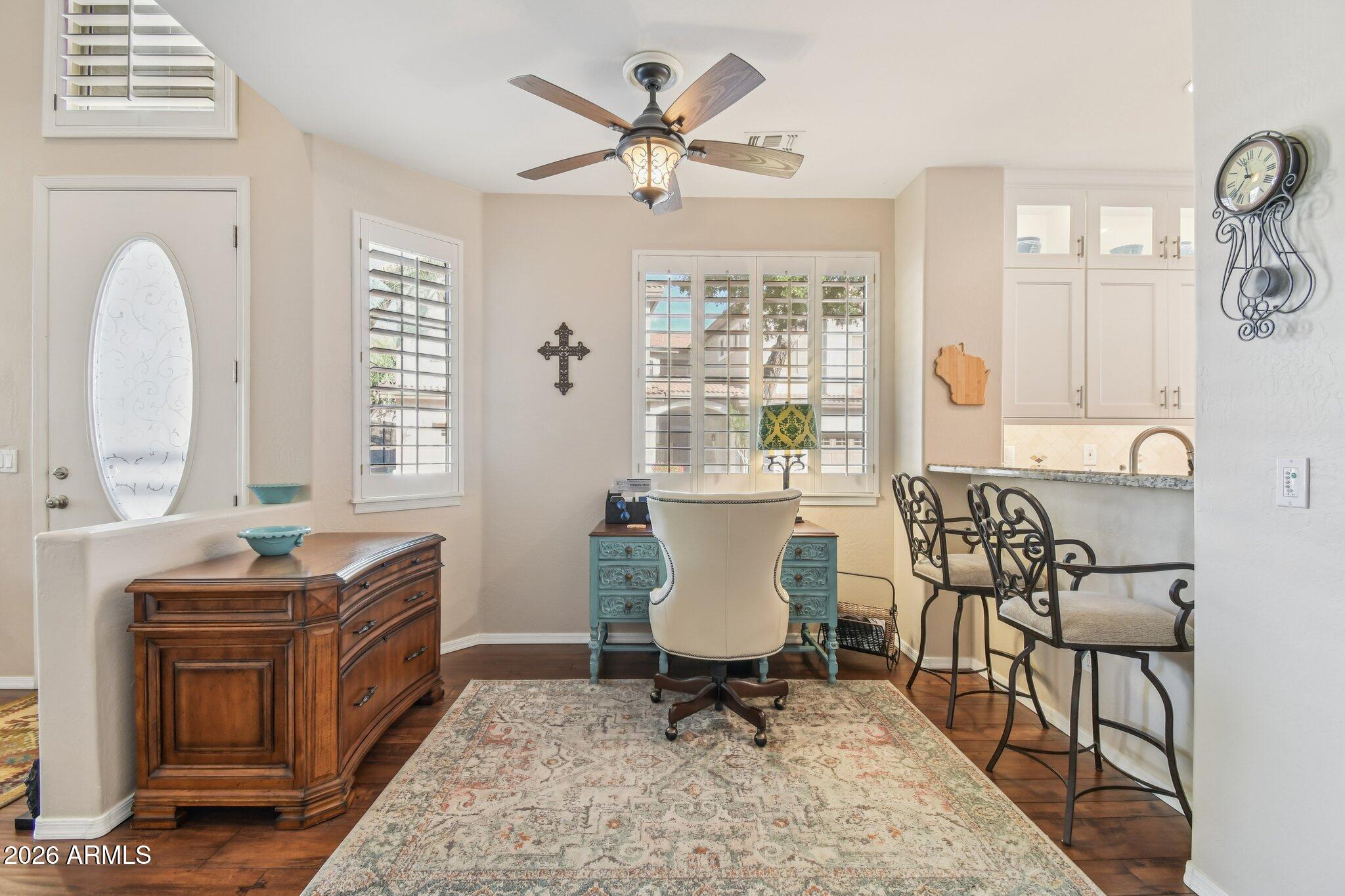 1024 East Frye Road, Unit 1039 Phoenix, AZ 85048 - Photo 6 of 32 a living room with furniture a window and a potted plant