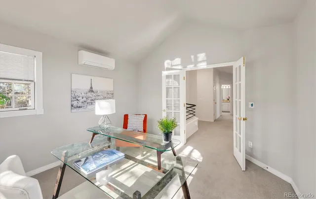 a bathroom with a sink a vanity and a mirror