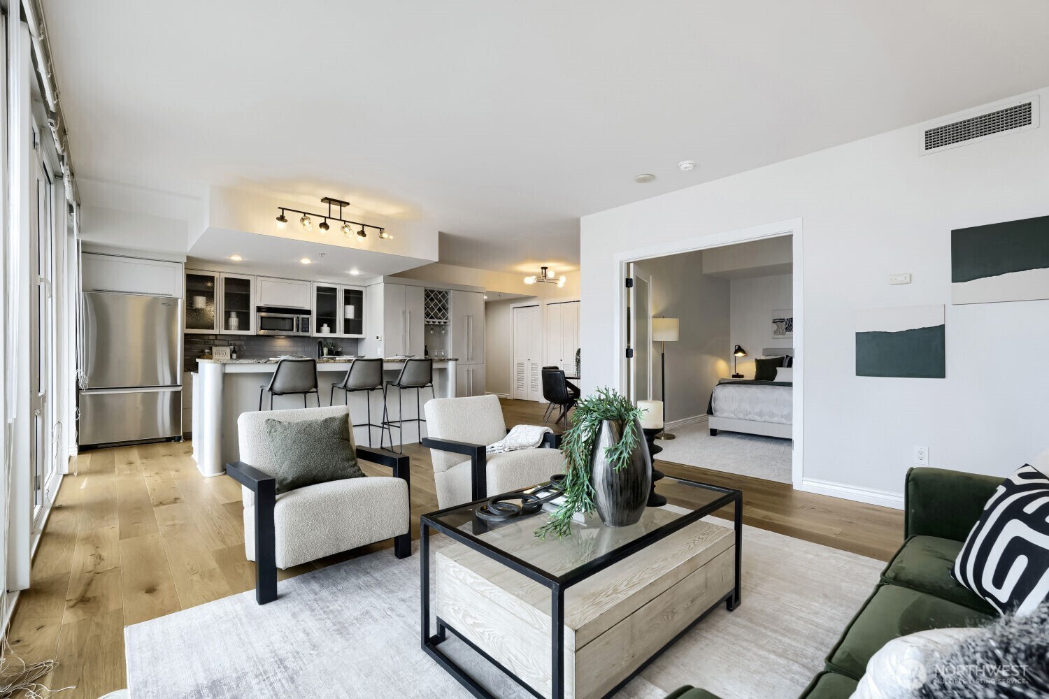 76 Cedar Street, Unit 1109 Seattle, WA 98121 - Photo 12 of 28 a living room with furniture and view of kitchen