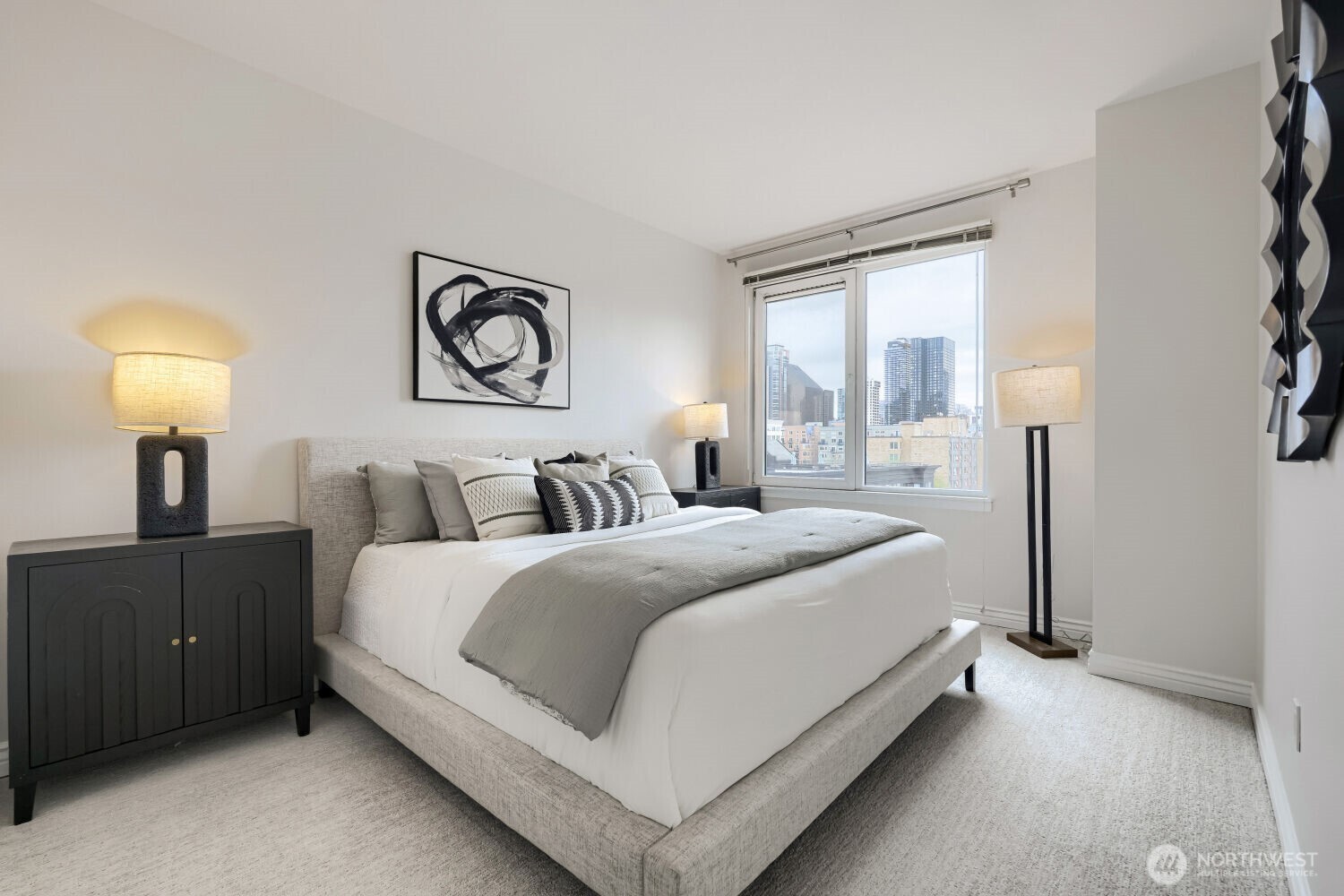 76 Cedar Street, Unit 1109 Seattle, WA 98121 - Photo 16 of 28 a bedroom with bed and window