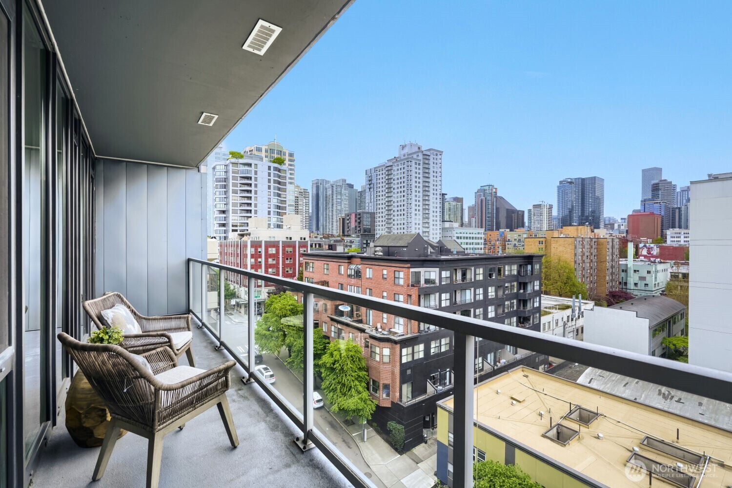 76 Cedar Street, Unit 1109 Seattle, WA 98121 - Photo 23 of 28 a view of a balcony with wooden floor