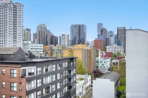 a view of a city with tall buildings