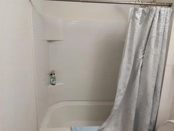a bathroom with a sink double vanity and a mirror