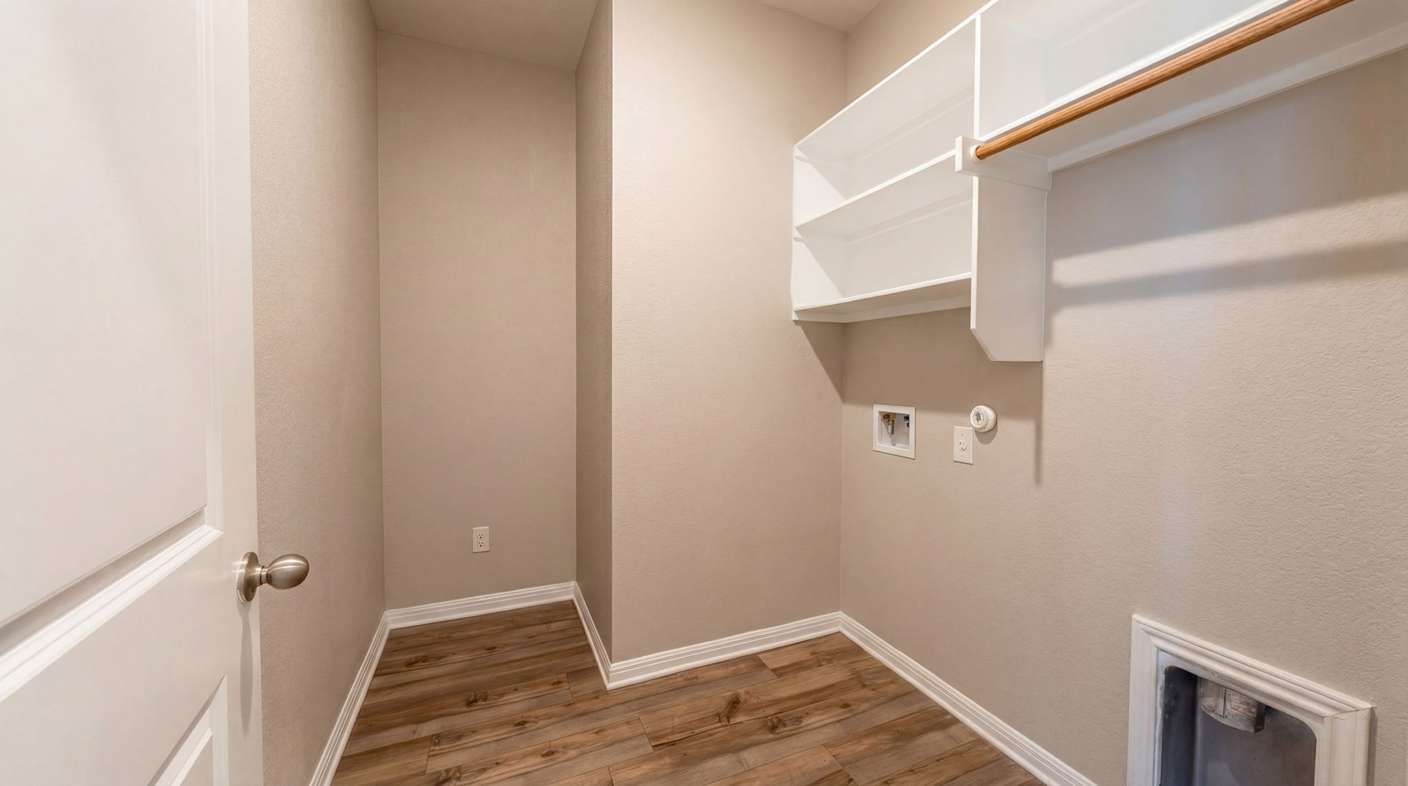 1003 Round Bale Road Hutto, TX 78634 - Photo 18 of 29 Laundry area with hookup for a gas dryer, wood finished floors, and hookup for a washing machine