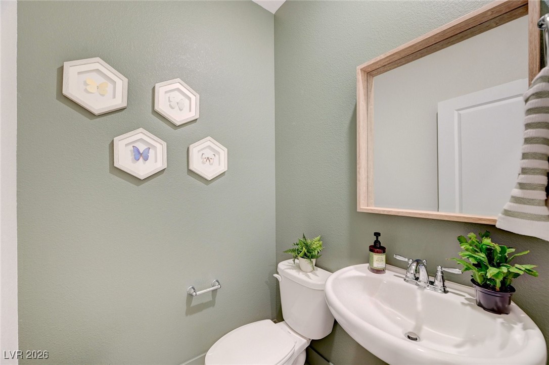 6502 Corsari Rdg Street Las Vegas, NV 89166 - Photo 23 of 59 Powder Bathroom