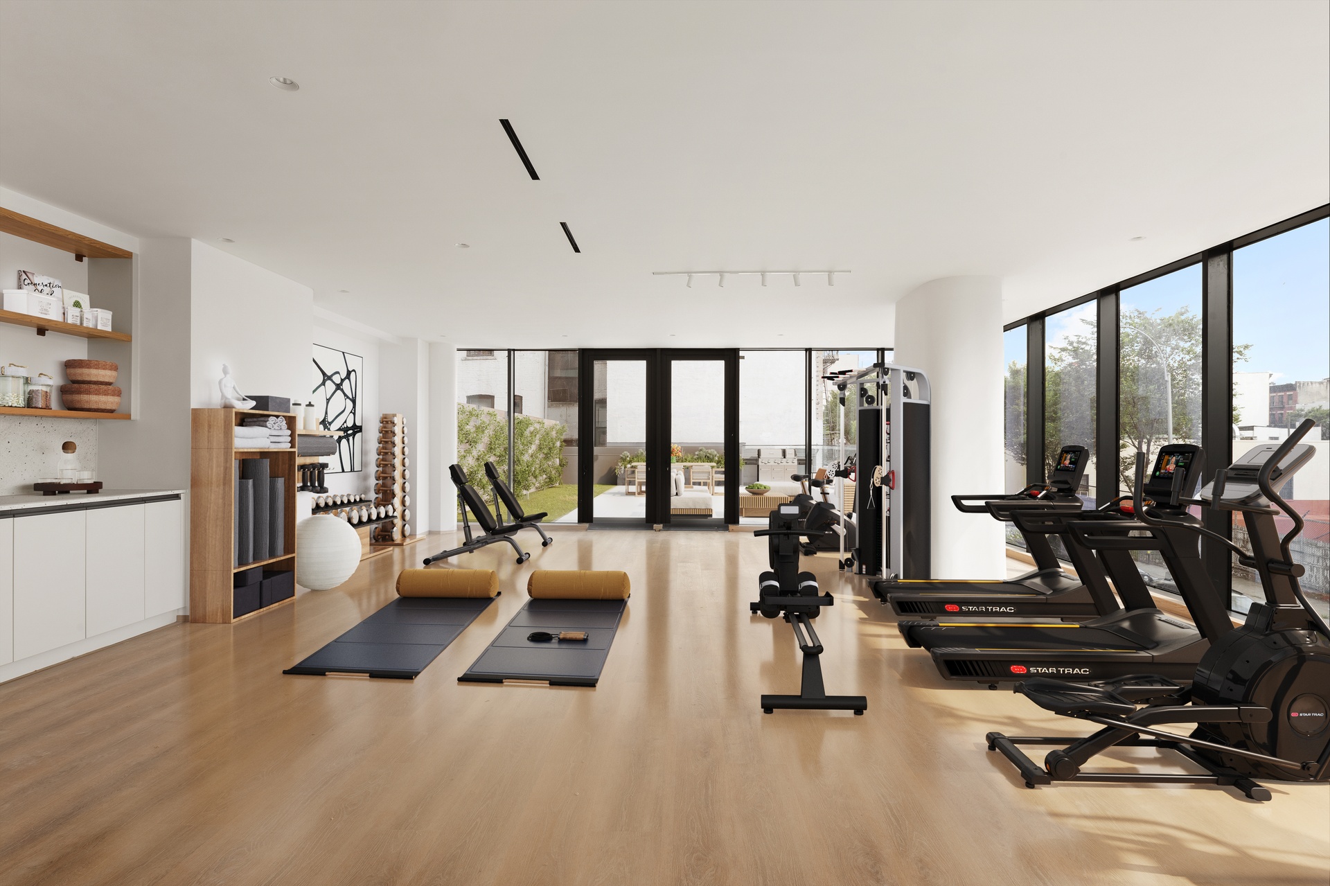 179 20th Street, Unit 7C Brooklyn, NY 11232 - Photo 6 of 9 a view of a room with gym equipment