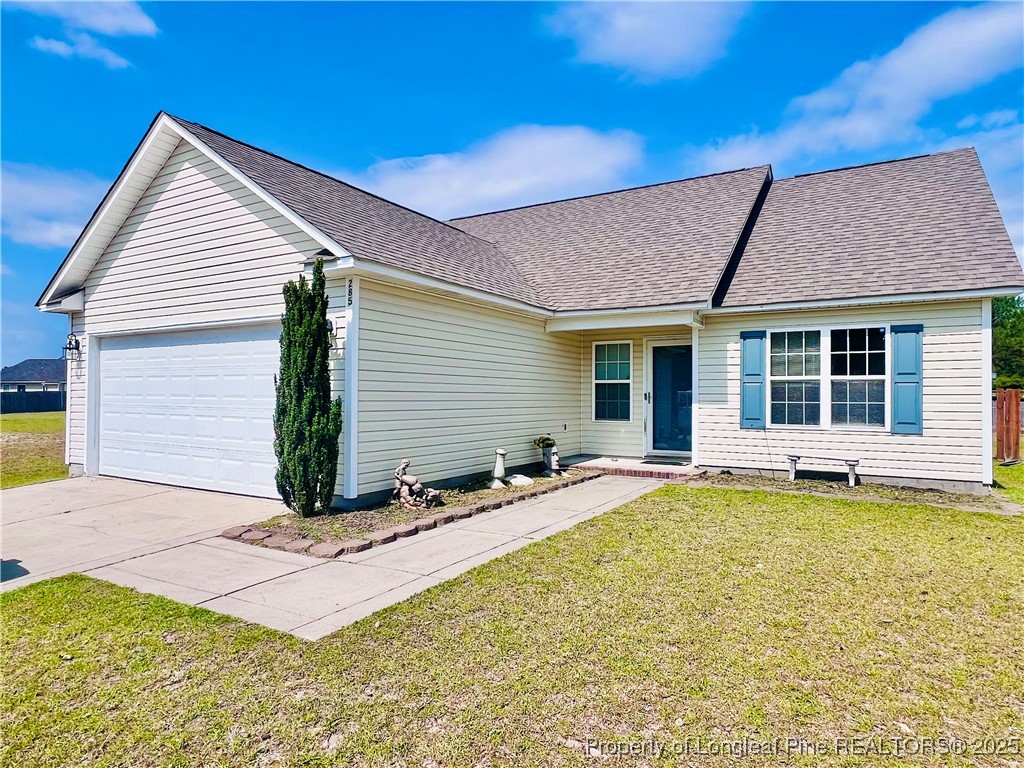 285 Pebble Lane Raeford, NC 28376 - Photo 2 of 7 a view of a house with pool and sitting area