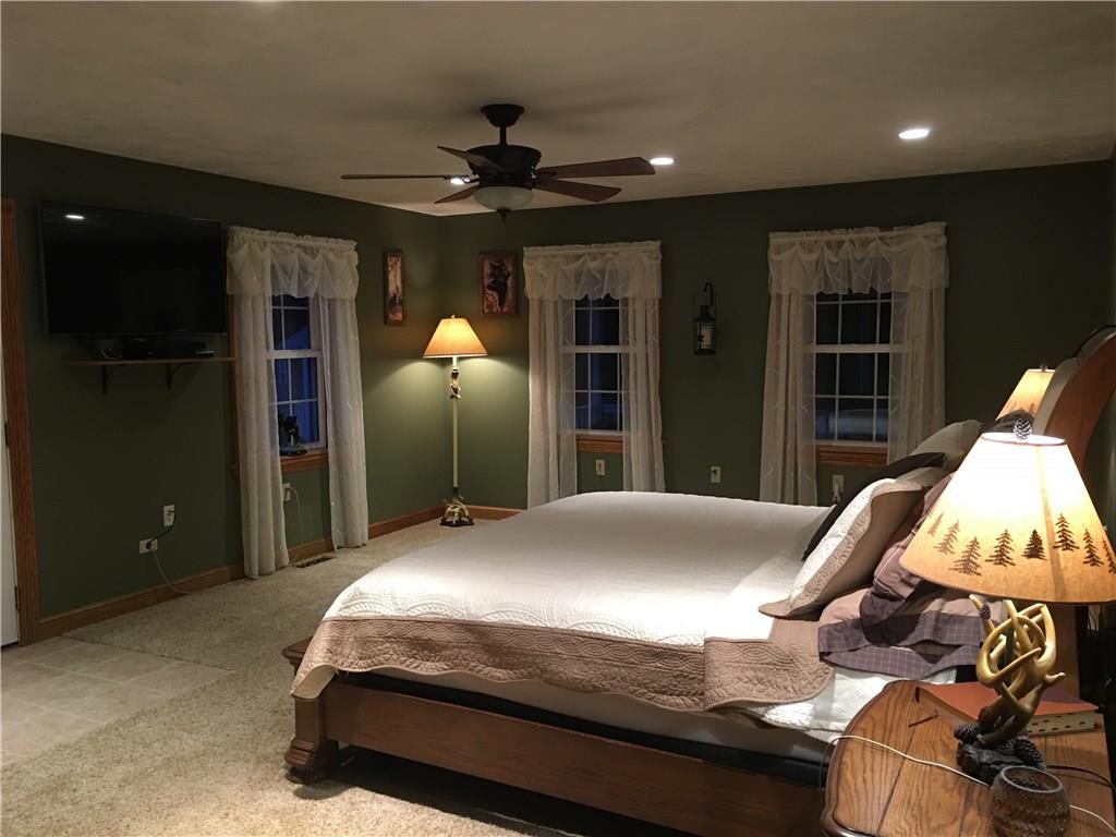 313 Tonkin Road Indiana, PA 15701 - Photo 3 of 14 Large master with walkout to deck and pool . . .comfortable AND cozy!!