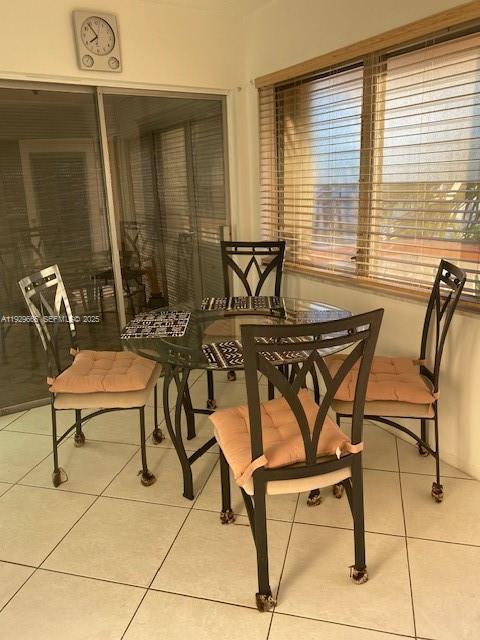 1000 Southwest 11th Avenue, Unit 20E Hallandale Beach, FL 33009 - Photo 11 of 12 a view of a patio with table and chairs