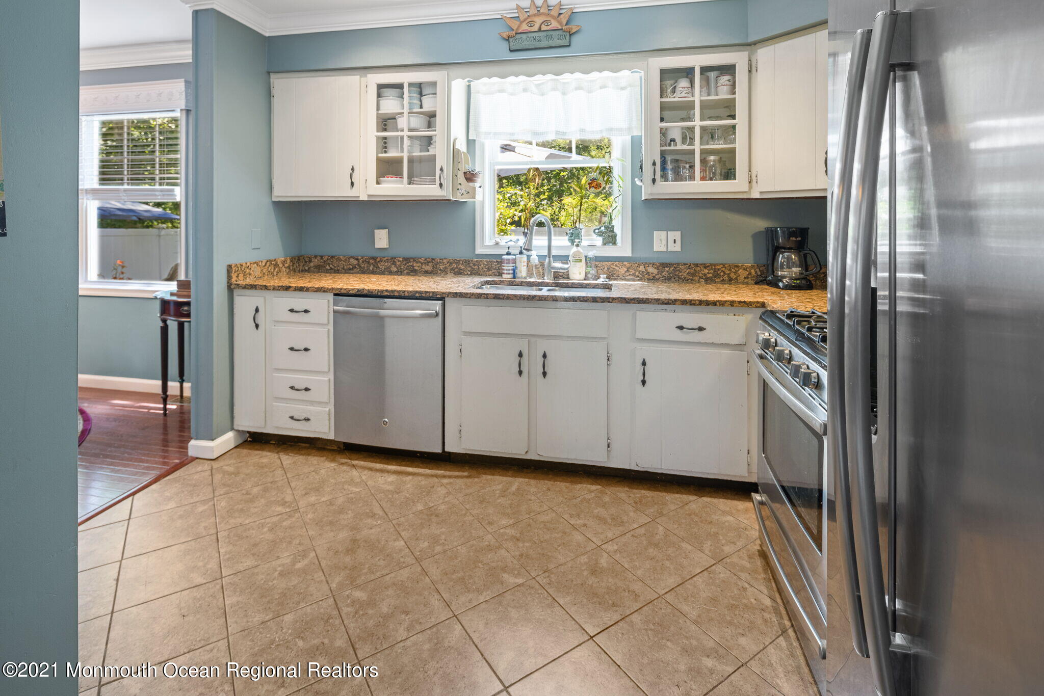 245 Crows Nest Road Manahawkin, NJ 08050 - Photo 12 of 79 a kitchen with granite countertop a sink stainless steel appliances and cabinets
