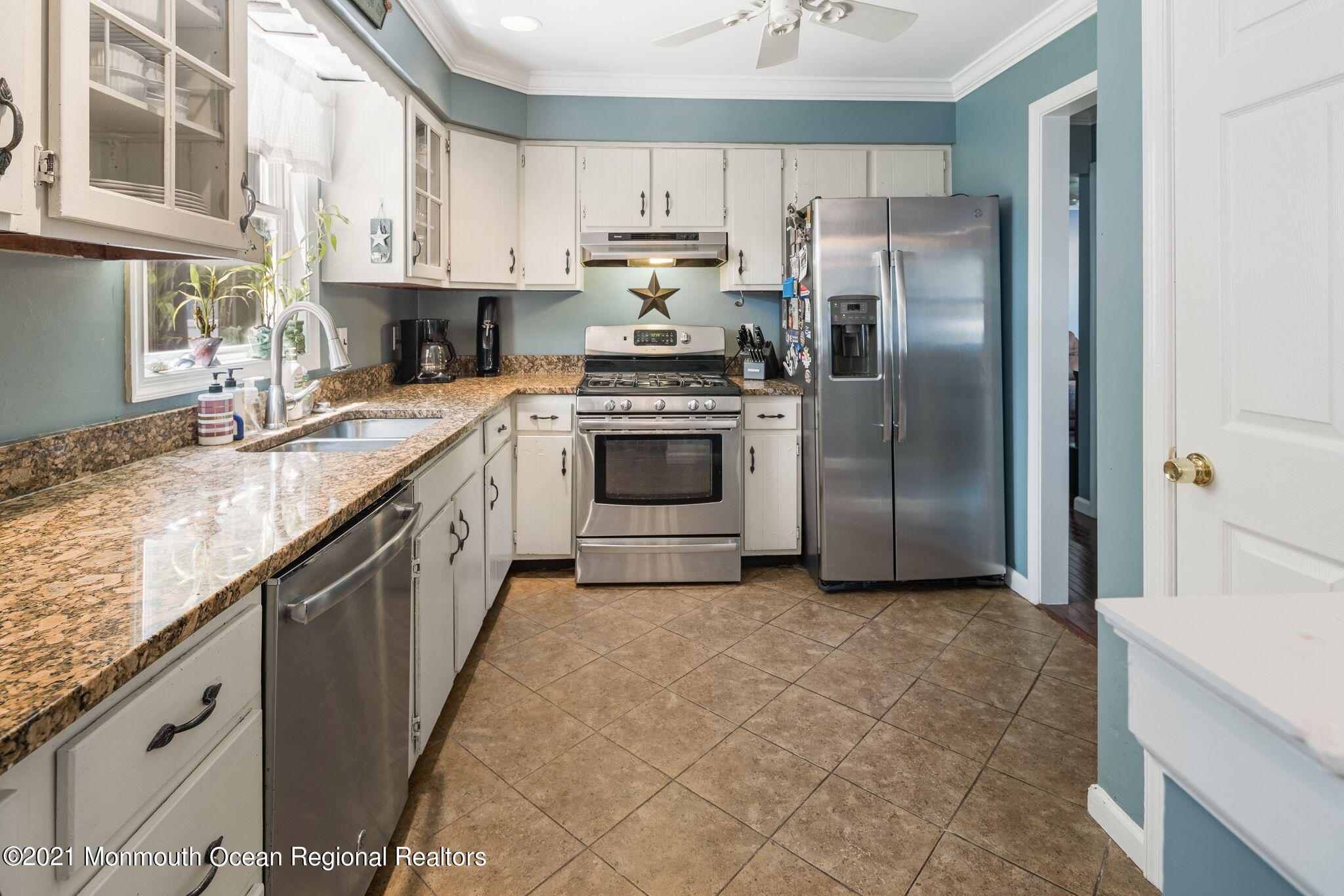 245 Crows Nest Road Manahawkin, NJ 08050 - Photo 15 of 79 a kitchen with stainless steel appliances granite countertop a refrigerator a stove and a sink