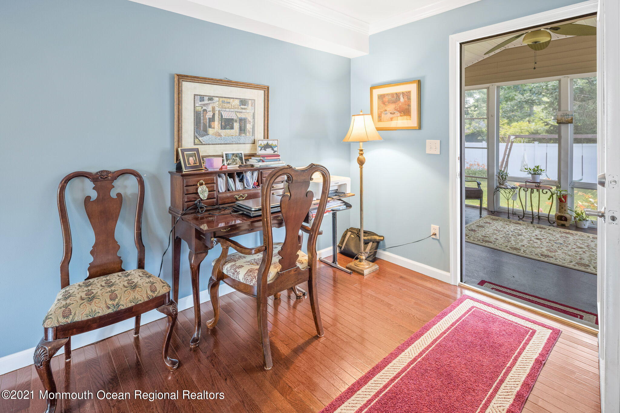 245 Crows Nest Road Manahawkin, NJ 08050 - Photo 20 of 79 a dining room with furniture and a floor to ceiling window