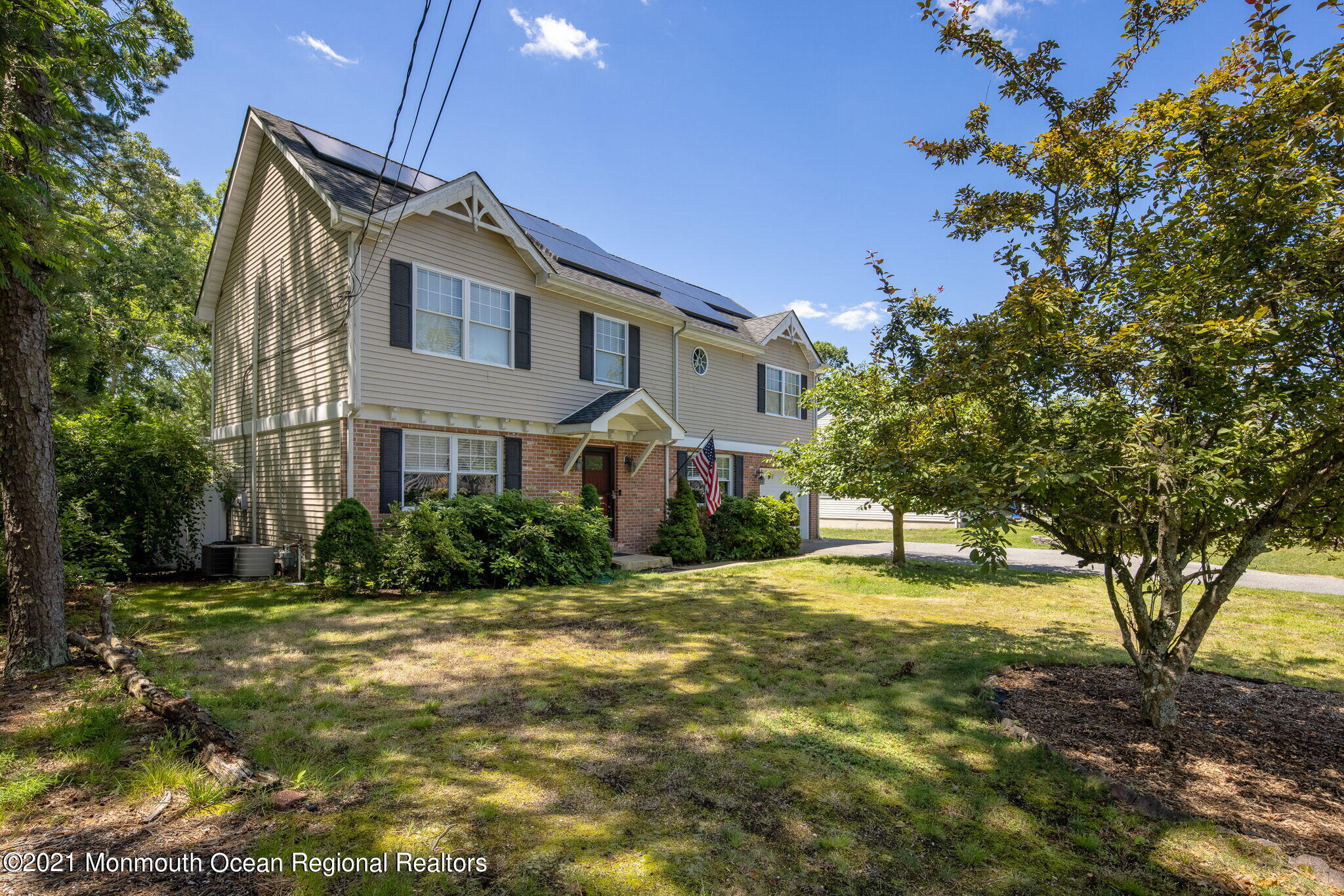 245 Crows Nest Road Manahawkin, NJ 08050 - Photo 3 of 79 a front view of a house with a yard