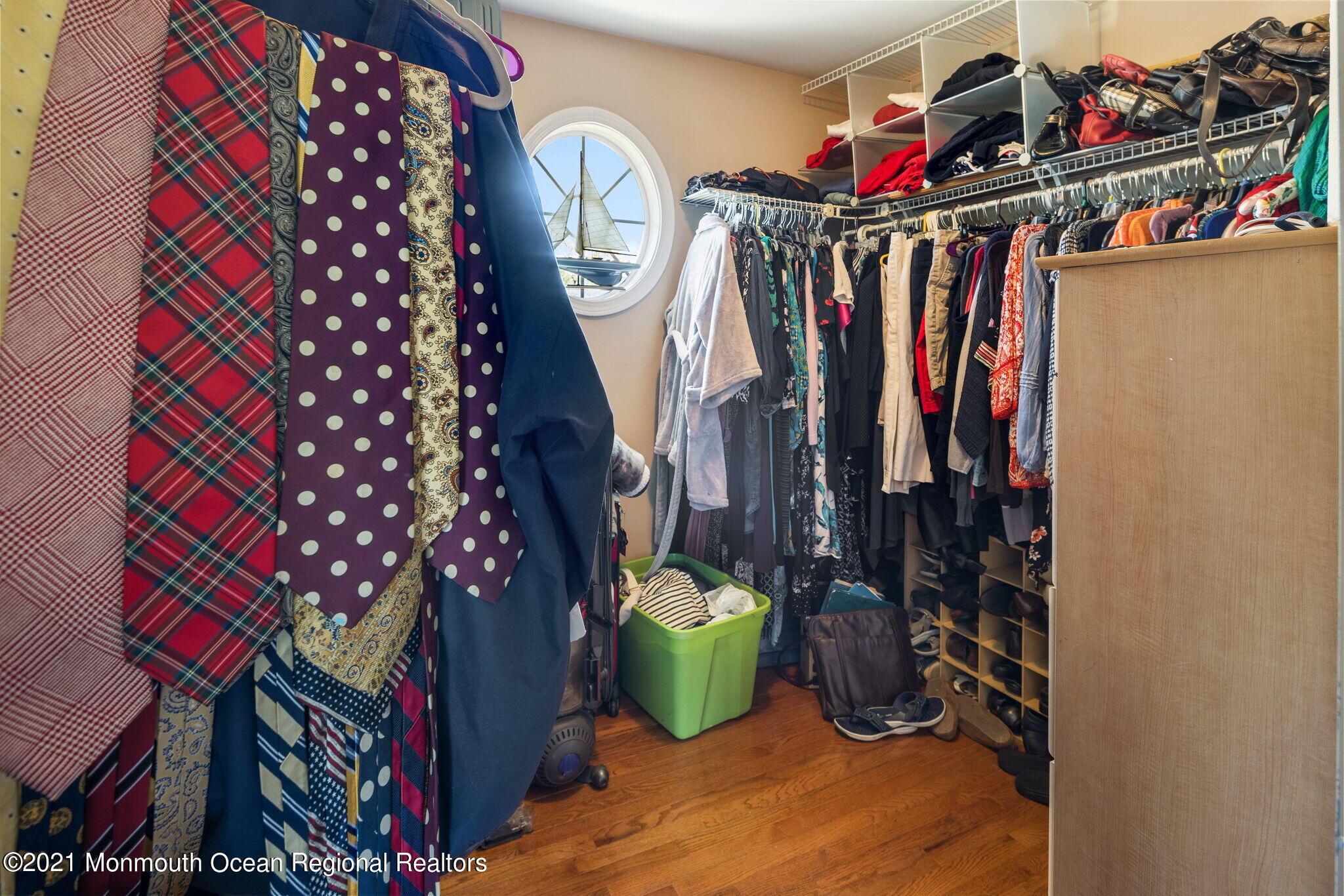 245 Crows Nest Road Manahawkin, NJ 08050 - Photo 32 of 79 a view of walk in closet with clothes and shoes