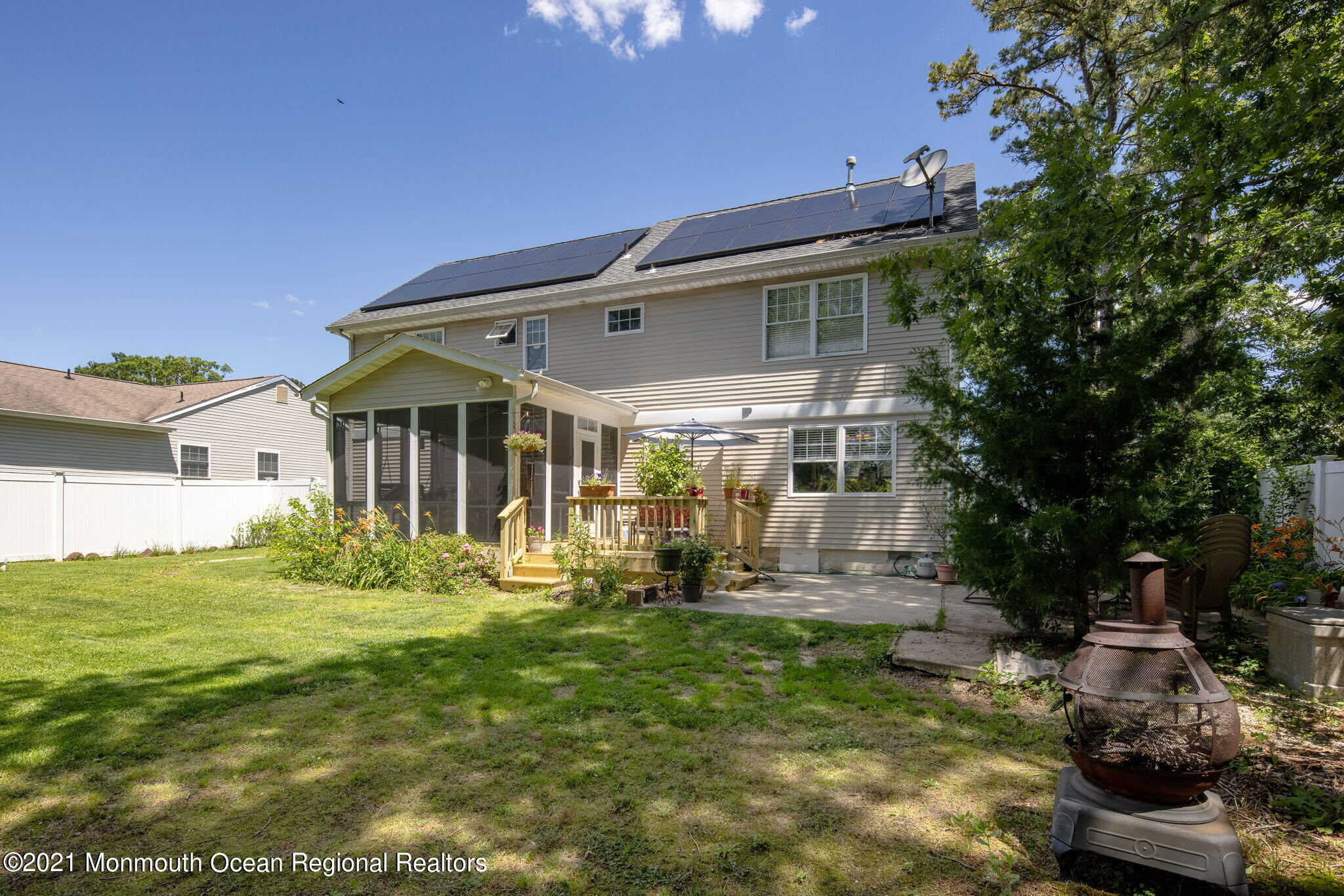 245 Crows Nest Road Manahawkin, NJ 08050 - Photo 50 of 79 a front view of a house with garden