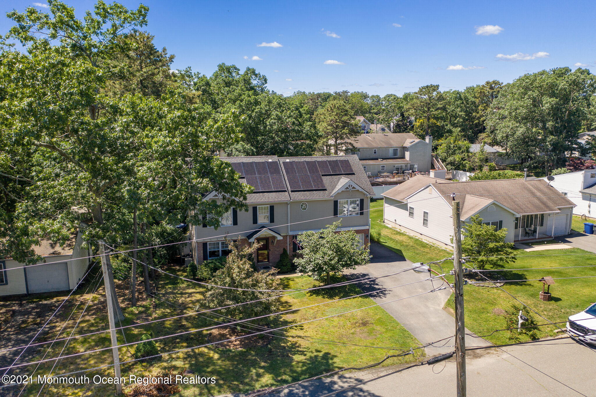 245 Crows Nest Road Manahawkin, NJ 08050 - Photo 58 of 79 a view of a house with a yard and sitting area