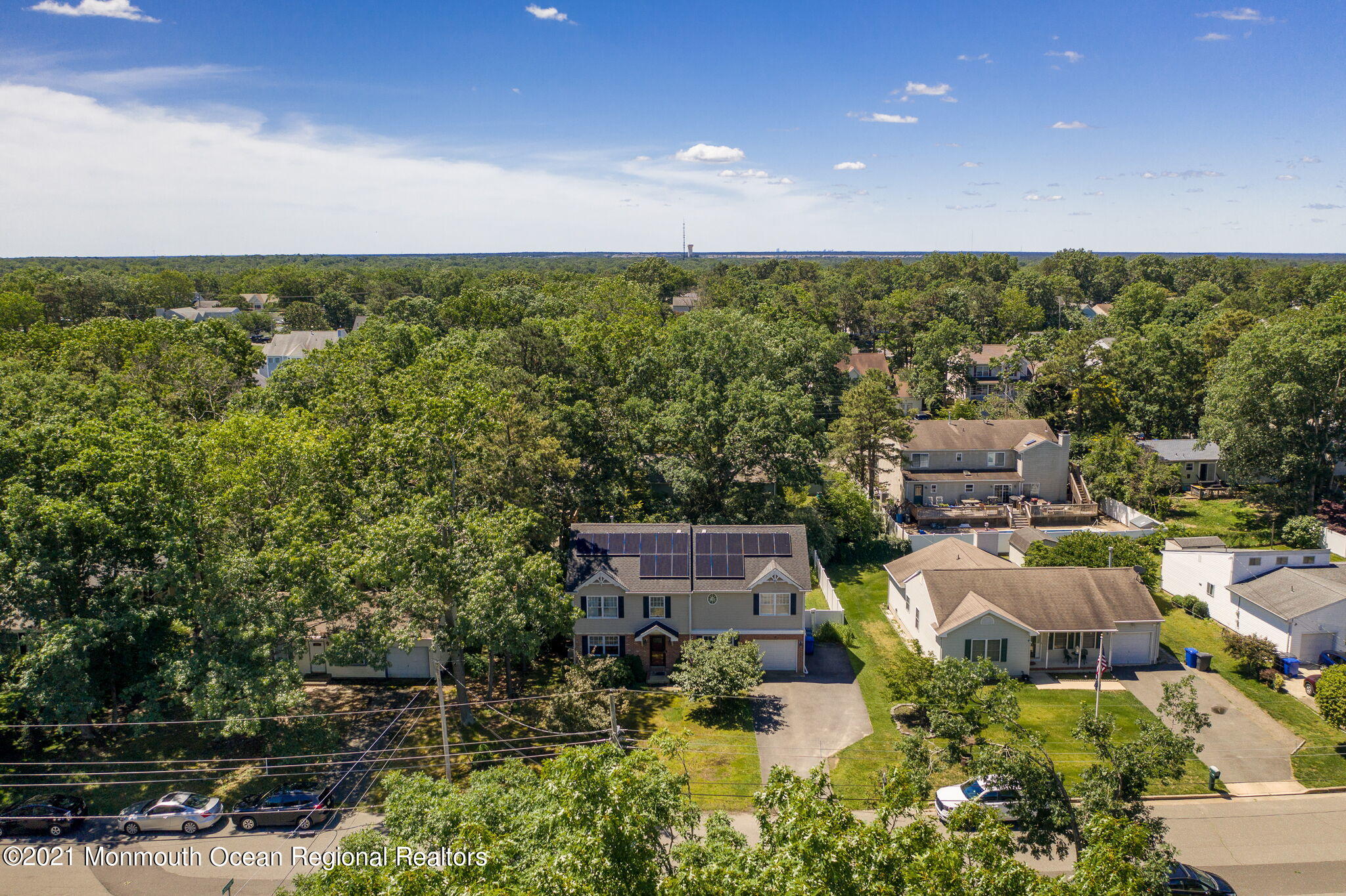 245 Crows Nest Road Manahawkin, NJ 08050 - Photo 59 of 79 an aerial view of a house with a garden