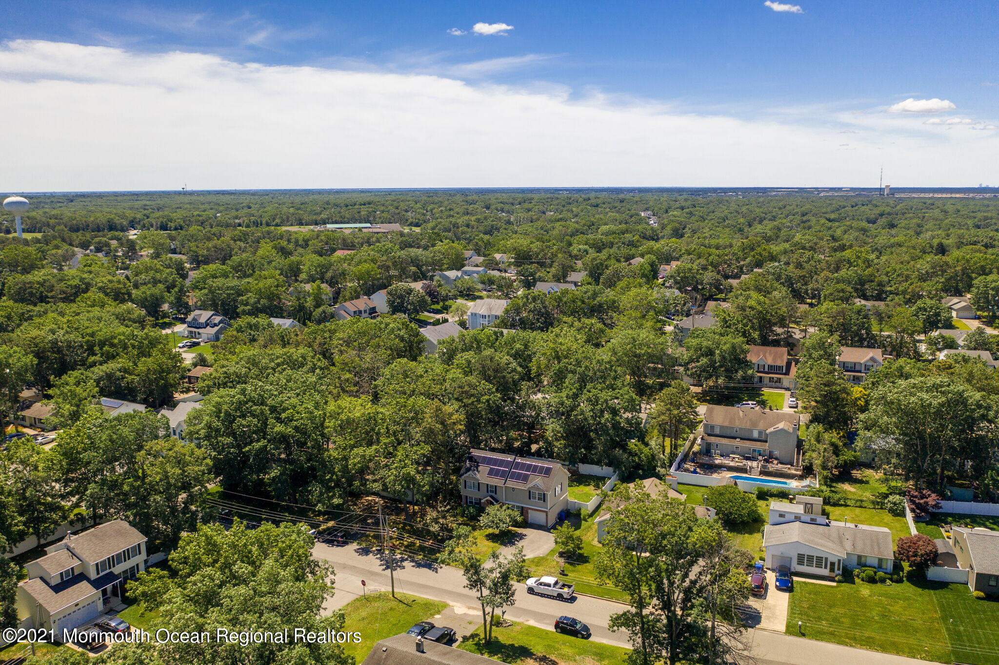 245 Crows Nest Road Manahawkin, NJ 08050 - Photo 60 of 79 an aerial view of a city with lots of residential buildings