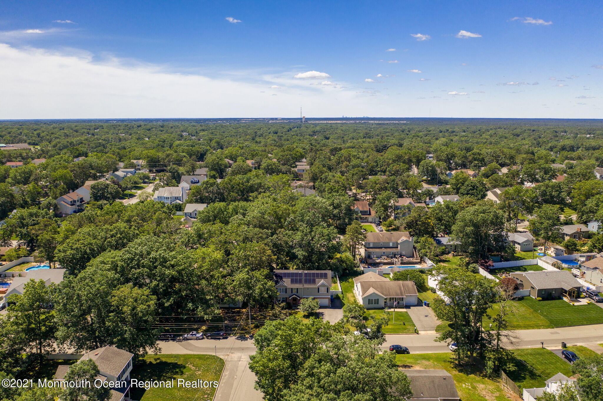 245 Crows Nest Road Manahawkin, NJ 08050 - Photo 61 of 79 an aerial view of a city with lots of residential buildings