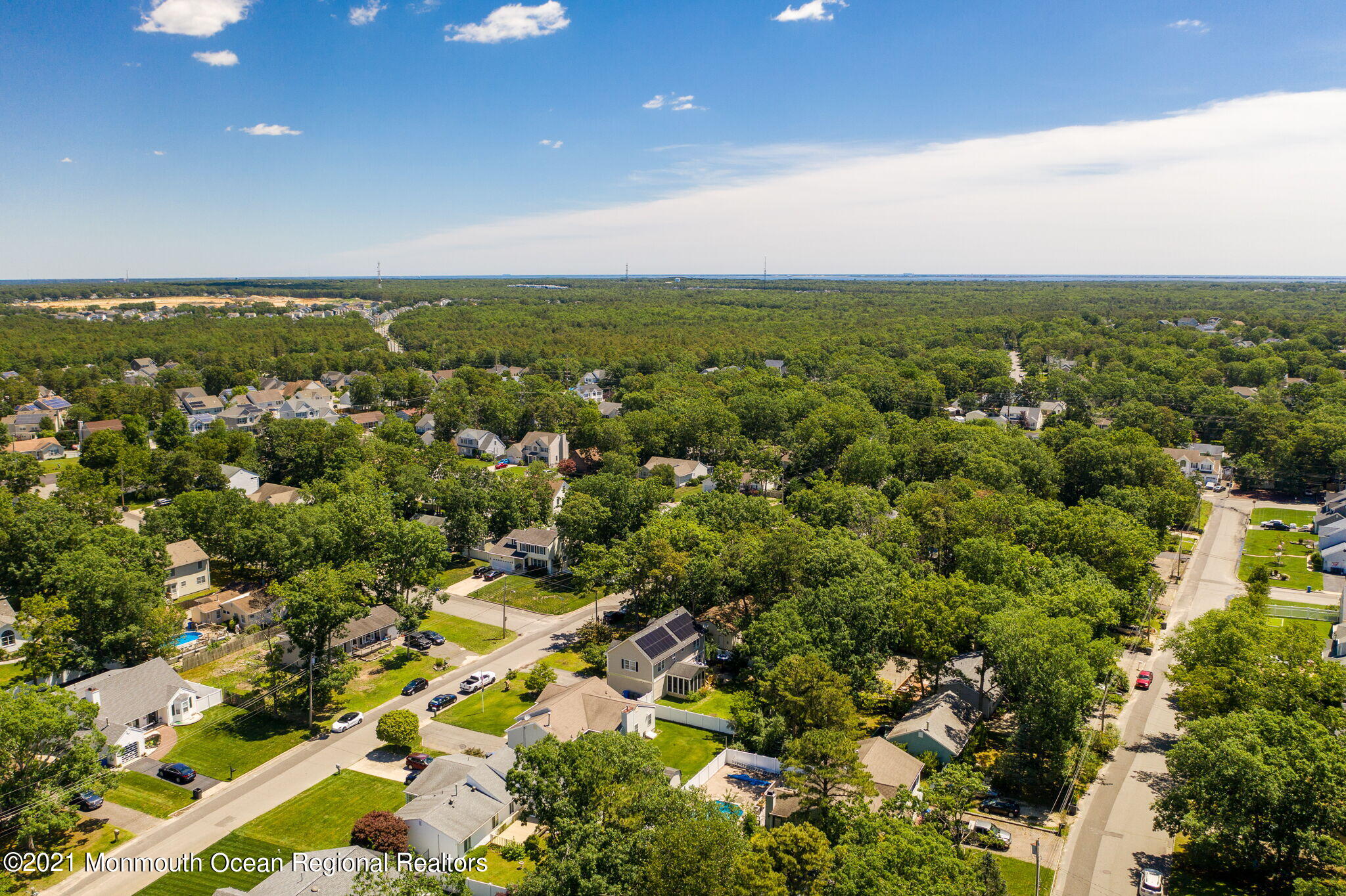 245 Crows Nest Road Manahawkin, NJ 08050 - Photo 74 of 79 an aerial view of a city with lots of residential buildings