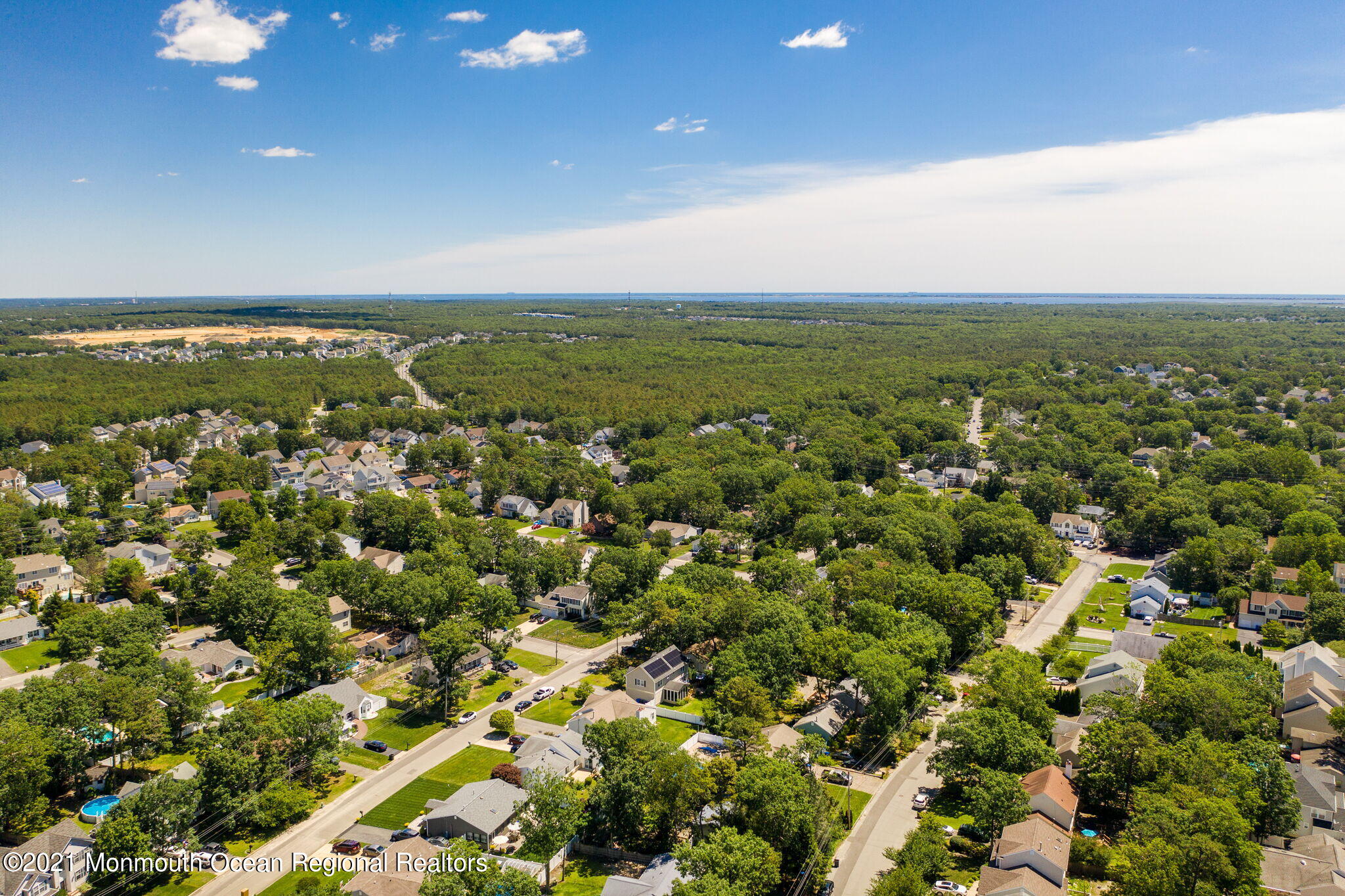 245 Crows Nest Road Manahawkin, NJ 08050 - Photo 75 of 79 an aerial view of residential houses with outdoor space and trees