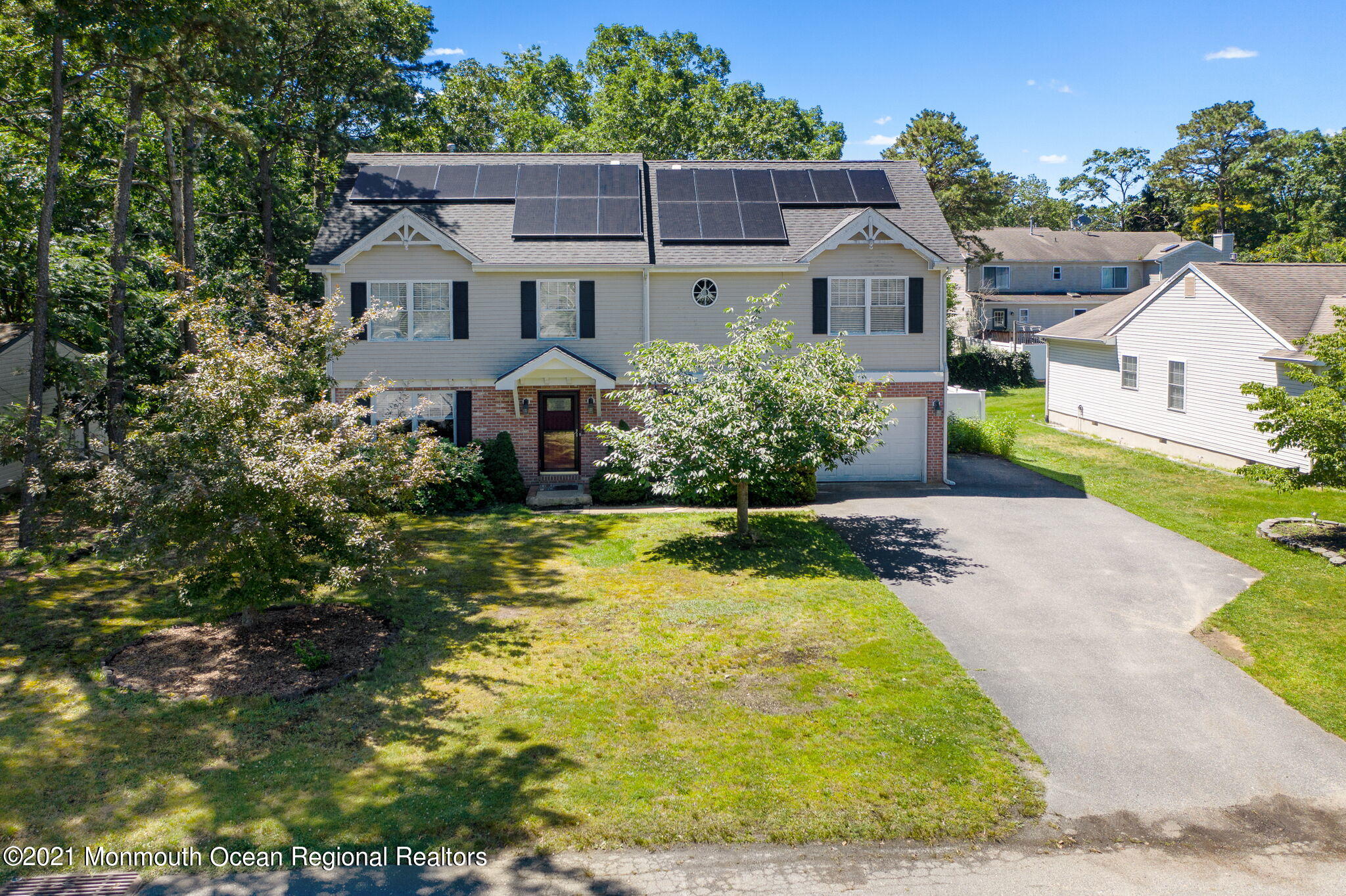 245 Crows Nest Road Manahawkin, NJ 08050 - Photo 79 of 79 a view of house with garden space and sitting area