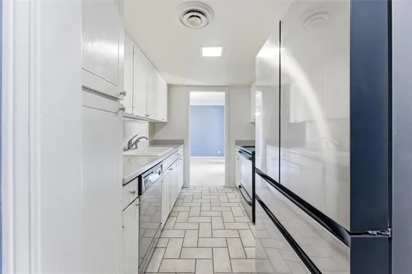 a bathroom with a toilet and a bathtub