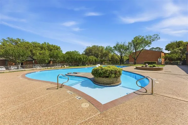 a view of a swimming pool and lake