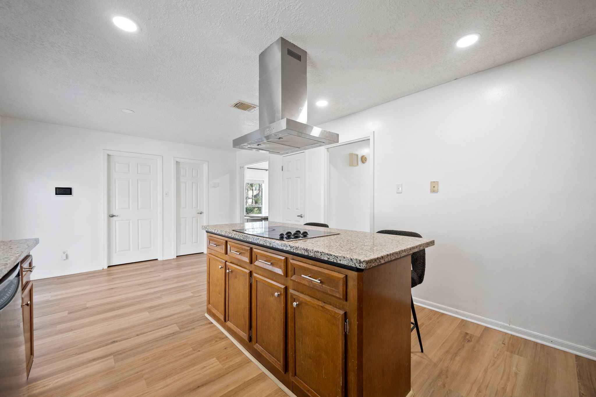14907 Oak Bluff Court Houston, TX 77070 - Photo 7 of 19 a kitchen with stainless steel appliances granite countertop a stove and a sink