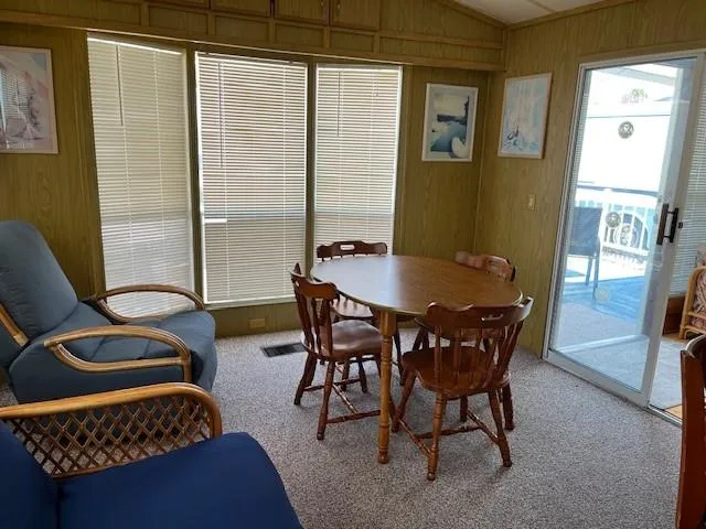 a kitchen with sink cabinets and window