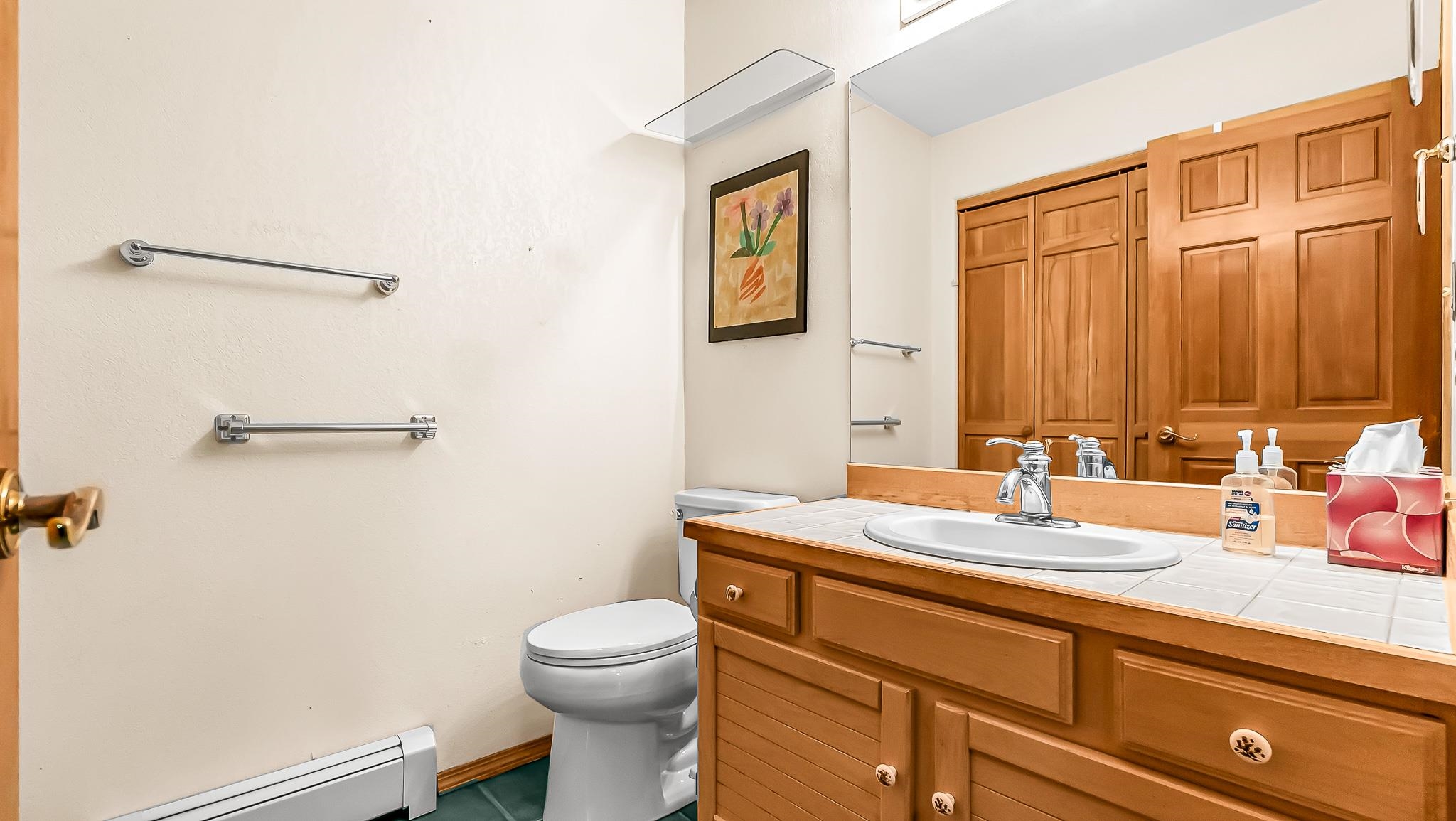 12 West Ridge Court Parachute, CO 81635 - Photo 27 of 37 a bathroom with a sink a toilet and mirror