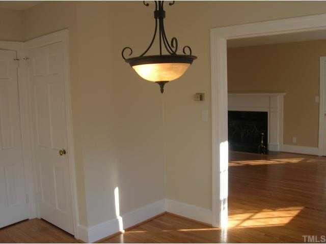 127 Brooks Avenue Raleigh, NC 27607 - Photo 5 of 11 This breakfast or sitting room off kitchen opens to living room. Cheery and bright.