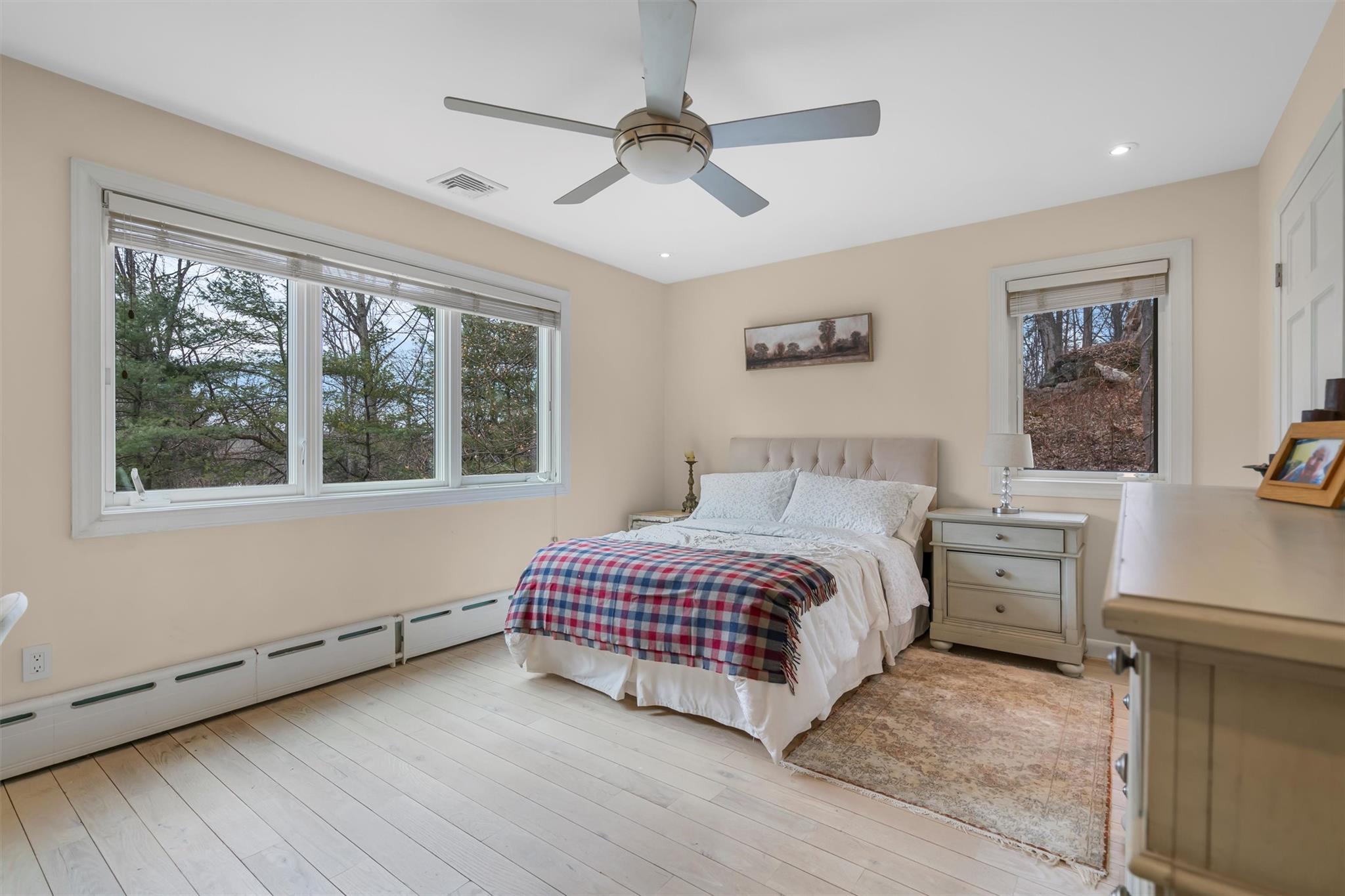 36 Chardavoyne Road Warwick, NY 10990 - Photo 17 of 46 Bedroom with visible vents, wood finished floors, recessed lighting, a baseboard radiator, and ceiling fan