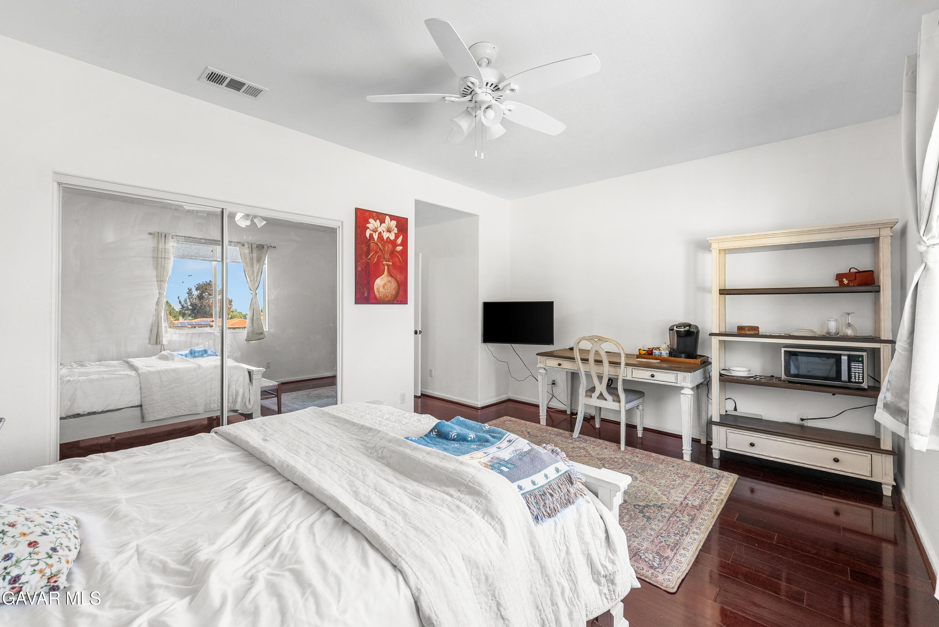 658 Lago Lindo Road Palmdale, CA 93550 - Photo 43 of 91 a bedroom with a bed and a flat screen tv