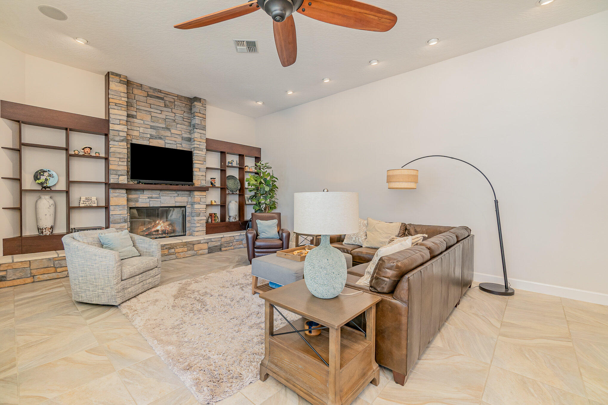789 Oak Park Drive Melbourne, FL 32940 - Photo 22 of 44 a living room with furniture and a flat screen tv