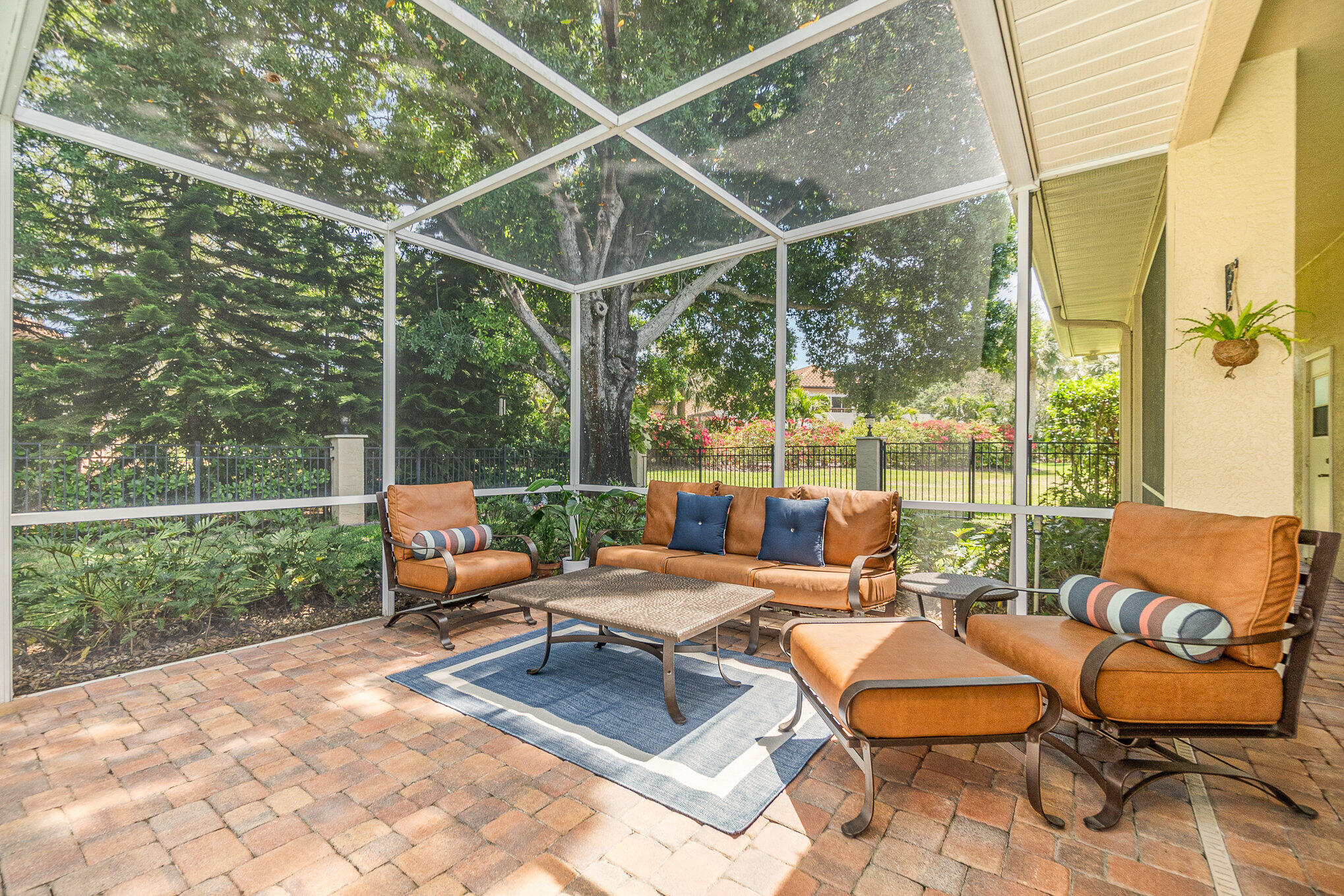 789 Oak Park Drive Melbourne, FL 32940 - Photo 31 of 44 a outdoor space with patio the couches and a dining table with garden view