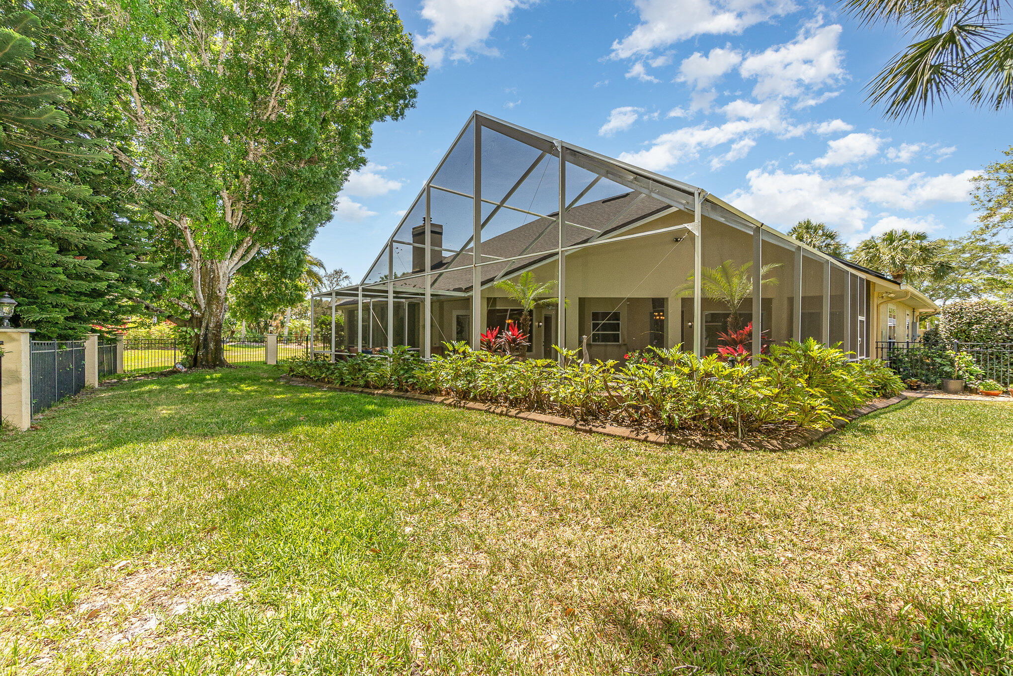 789 Oak Park Drive Melbourne, FL 32940 - Photo 35 of 44 a view of a house with backyard and garden