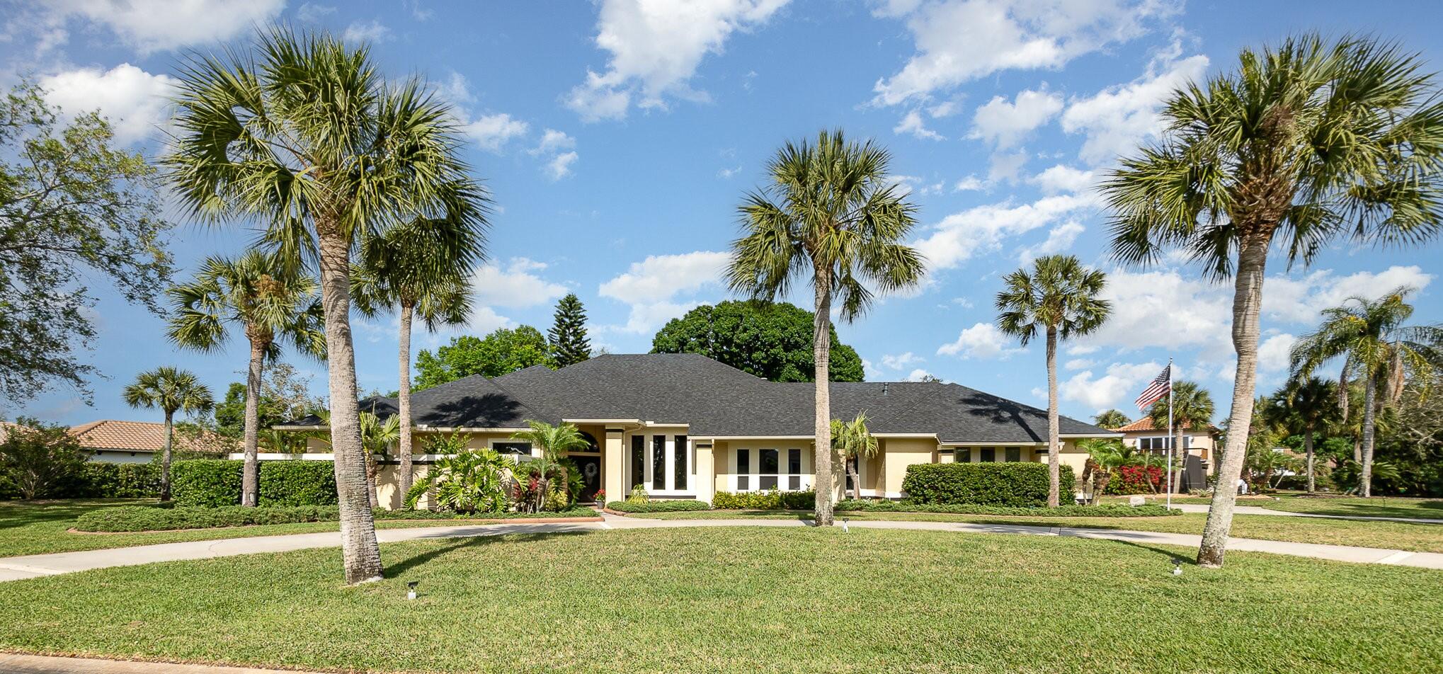 789 Oak Park Drive Melbourne, FL 32940 - Photo 43 of 44 front view of a house with a yard