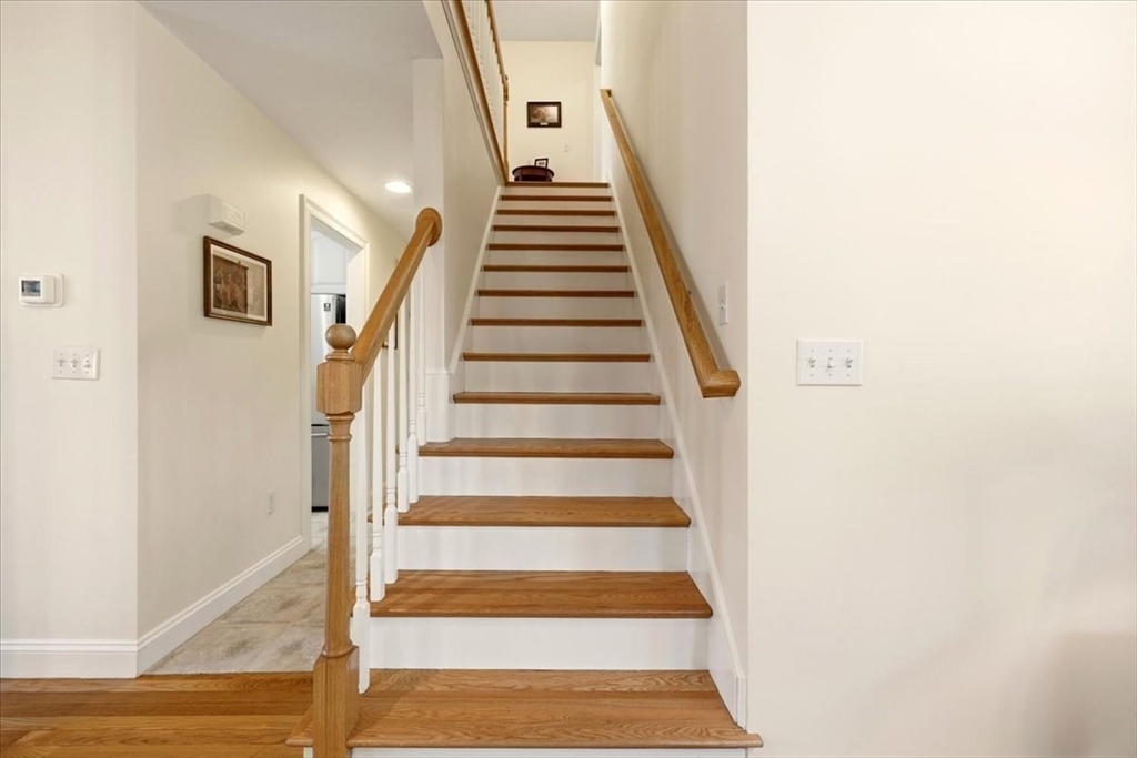 8 Country Circle, Unit 8 Norton, MA 02766 - Photo 22 of 42 a view of staircase with white walls