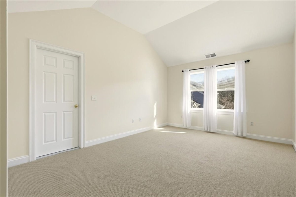 8 Country Circle, Unit 8 Norton, MA 02766 - Photo 27 of 42 an empty room with windows and closet