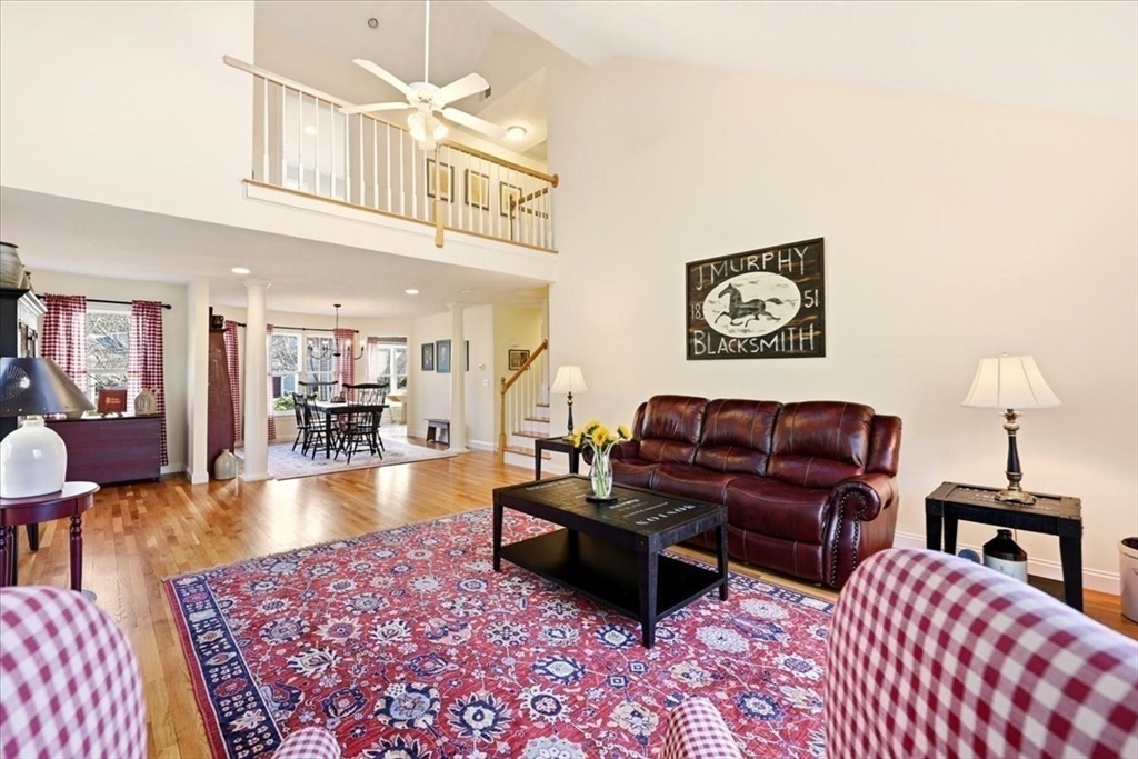 8 Country Circle, Unit 8 Norton, MA 02766 - Photo 10 of 42 a living room with furniture and a view of kitchen