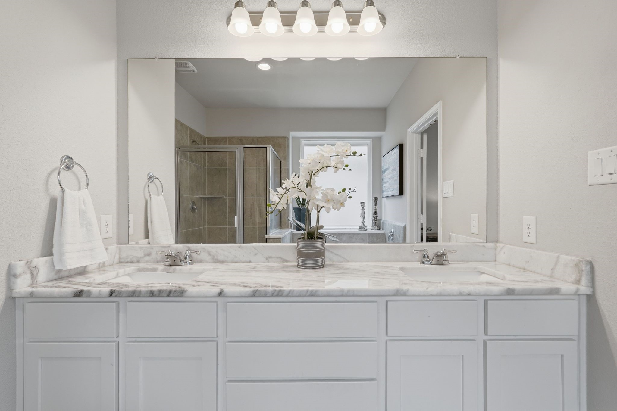 7522 Windsor View Drive Spring, TX 77379 - Photo 30 of 49 Spacious bath with dual vanities and a bright, open feel.