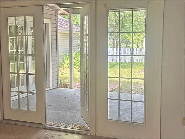 an empty room with windows