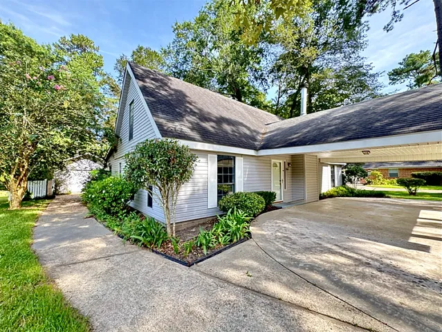 a view of a house with a garden