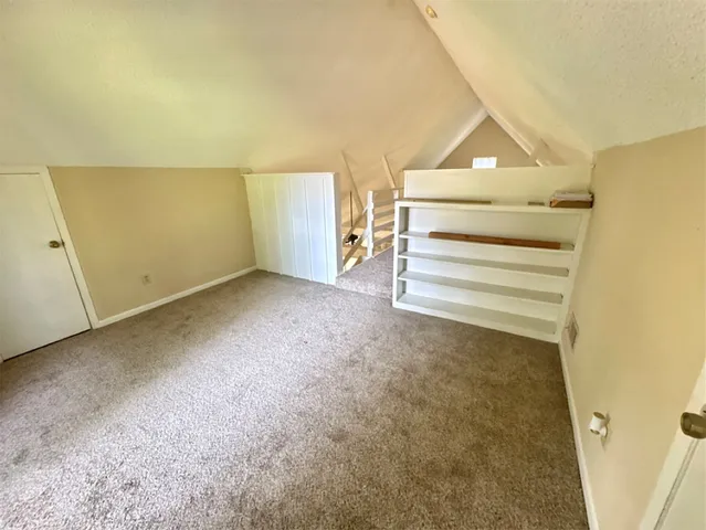 a view of room and front door