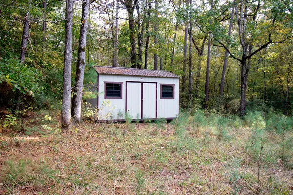 a house with trees in front of it