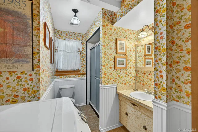 a view of a park with large trees