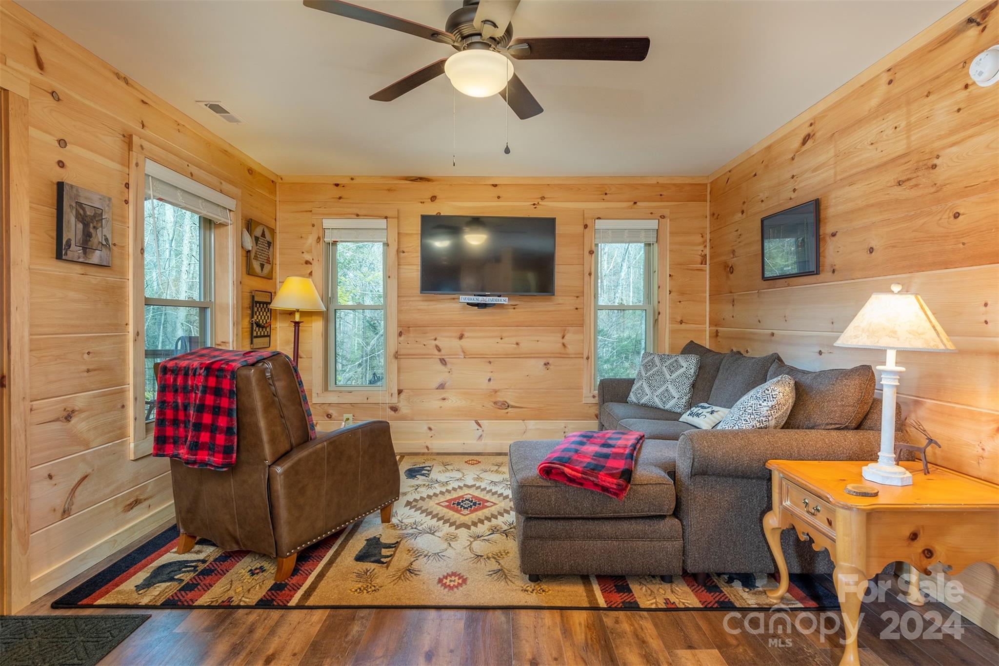 4125 Old Greenlee Road Marion, NC 28752 - Photo 12 of 48 a living room with furniture and a flat screen tv