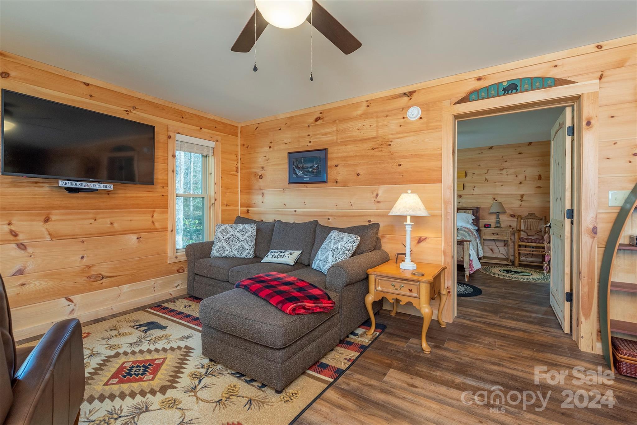 4125 Old Greenlee Road Marion, NC 28752 - Photo 13 of 48 a living room with furniture and a flat screen tv