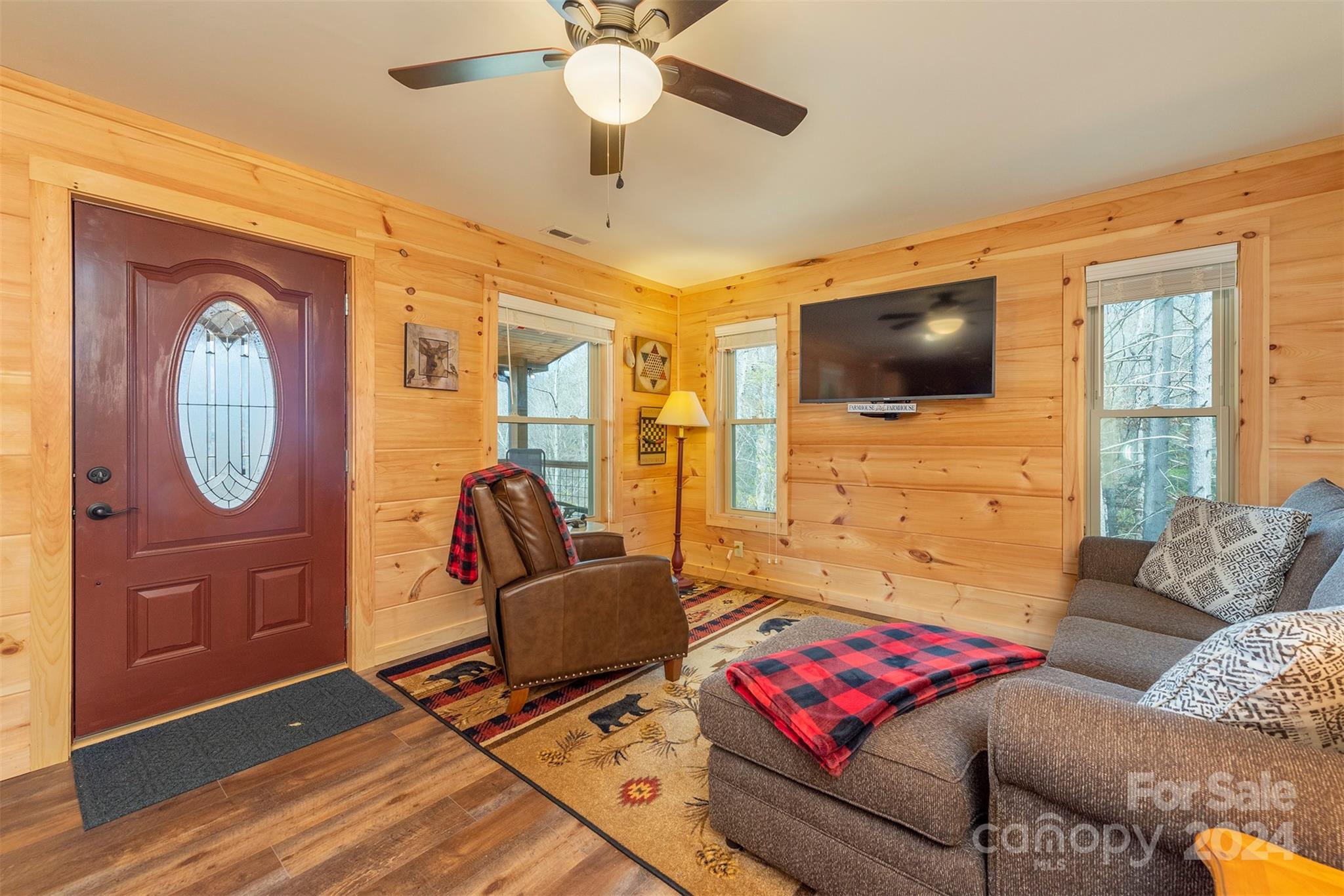 4125 Old Greenlee Road Marion, NC 28752 - Photo 19 of 48 a living room with furniture and a flat screen tv